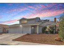 Charming home featuring a spacious three-car garage and well-maintained landscaping at 3547 Rosewood St, Las Vegas, NV 89103