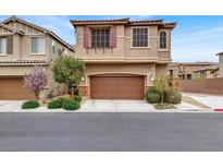 Charming home with a two-car garage and well-maintained landscaping for curb appeal at 10802 Galveston Bay St, Las Vegas, NV 89179