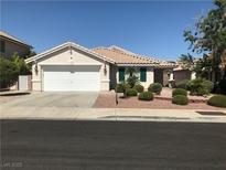 Charming single-story home featuring a two-car garage and desert landscaping at 331 Mount Hope St, Henderson, NV 89014