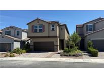 Charming two-story home featuring a two-car garage, desert landscaping, and a welcoming front entryway at 4181 Nopal Serrano Ave, Las Vegas, NV 89141