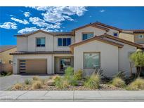 Beautiful two-story home with a two-car garage and desert landscaping at 195 Cactus Sunrise St, Las Vegas, NV 89138
