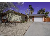 Charming single-story home featuring a two-car garage and low-maintenance landscaping at 6244 Eugene Ave, Las Vegas, NV 89108