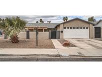 Charming single-story home with a well-maintained yard and a two-car garage at 2172 Mccoig Ave, Las Vegas, NV 89119