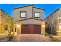 Charming two-story home with a well-maintained front yard and inviting curb appeal at 5236 Sunstone Mesa Dr, Las Vegas, NV 89166