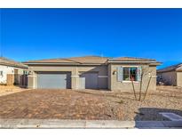 Charming single-story home with a three-car garage and beautiful brick driveway at 5846 Slate Rock Ct, Las Vegas, NV 89149