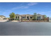 Charming single-story home with manicured front yard and desert landscaping at 5812 Shangri La Night Ct, Las Vegas, NV 89149