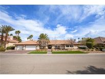 Charming single-story home with a well-manicured front yard and a two-car garage at 3236 Cliff Sieler Ct, Las Vegas, NV 89117