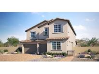 Charming two-story home featuring a two-car garage, desert landscaping, and a welcoming front entrance gate at 770 Cloud Creek St, Henderson, NV 89015