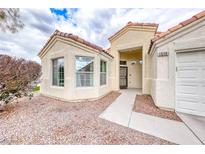 Charming single-story home showcasing a well-maintained front yard and inviting entrance at 1516 Dusty Canyon St, Henderson, NV 89052