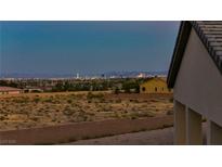 Distant city skyline view from the home showcasing Las Vegas and desert landscape at 9570 Verde Way, Las Vegas, NV 89149