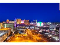 Breathtaking night view of the Las Vegas strip with vibrant lights and iconic landmarks at 125 E Harmon Ave # 2801&2803, Las Vegas, NV 89109