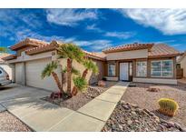 Charming single story home featuring desert landscaping, concrete walkway, and a neutral color scheme at 3509 Altar Rock Ln, North Las Vegas, NV 89032