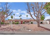 Charming single-story home featuring mature trees, desert landscaping, and a welcoming entrance with beautiful curb appeal at 3681 S Rosecrest Cir, Las Vegas, NV 89121