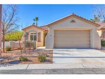 Charming single-story home features a two-car garage and low maintenance desert landscaping at 3685 Australian Cloud Dr, Las Vegas, NV 89135
