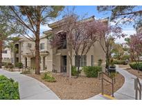 Beautiful multi-story condo with balcony, desert landscaping, and sidewalk at 9050 W Warm Springs Rd # 1093, Las Vegas, NV 89148