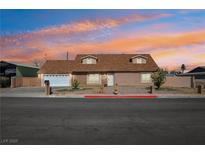 Charming single-story home features a well-maintained yard and a two-car garage at 4528 Welter Ave, Las Vegas, NV 89104
