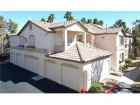 Inviting condo with tile roof and attached three-car garage in a desirable location at 75 N Valle Verde Dr # 1822, Henderson, NV 89074