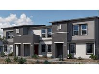Modern townhome featuring a two-tone color scheme and stylish front yard landscaping at 9451 Calm Stream Ave # Lot 81, Las Vegas, NV 89178