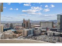 Expansive Las Vegas city view showcasing iconic landmarks and a vibrant skyline under a bright blue sky at 145 E Harmon Ave # 3007, Las Vegas, NV 89109