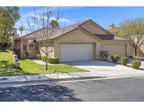 Charming single-story home featuring a three-car garage and well-maintained front yard at 3097 Quail Crest Ave, Henderson, NV 89052