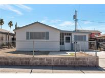 Charming single-story home featuring a freshly painted exterior and well-maintained landscaping at 517 Hopi Pl, Boulder City, NV 89005