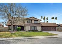 Charming two-story home with well-maintained lawn and a large three-car garage at 6603 Vigo Rd, Las Vegas, NV 89146