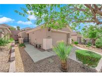 Charming single-story home featuring a two-car garage and inviting desert landscaping at 2709 Rue Montpellier Ave, Henderson, NV 89044