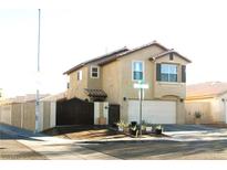 Charming two-story home with a gated entrance, complemented by well-manicured landscaping and a two car garage at 5381 Awbury Ave, Las Vegas, NV 89110