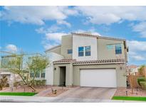 Modern two-story home features a two-car garage, desert landscaping, and tile roof at 9675 Bold Skye Ave, Las Vegas, NV 89166
