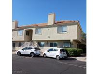 Inviting two-story exterior showcases a charming home with well-manicured landscaping at 746 Anne Ln, Henderson, NV 89015