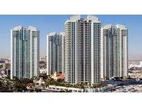 Striking exterior view of multiple high-rise luxury condominium buildings with balconies and city skyline at 2777 Paradise Rd # 607, Las Vegas, NV 89109