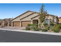 Charming single-story home with a three-car garage and desert landscaping at 4310 Lailah Skye Ave, Las Vegas, NV 89141