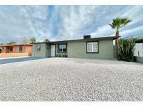Charming single-story home with desert landscaping and a well-maintained exterior at 604 N Minnesota St, Las Vegas, NV 89107