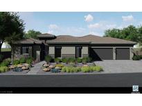Charming single-story home with neutral paint, stone accents, well-maintained landscaping, and a two-car garage at 9 Rue Grimaldi Way, Henderson, NV 89011