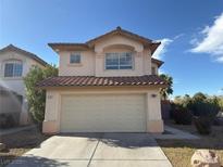 Charming two-story home featuring a two-car garage and well-maintained landscaping at 929 Toro Canyon Ln, Las Vegas, NV 89134