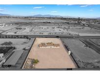 Expansive property with a large, undeveloped lot, offering ample space for customization and future development opportunities at 4011 W Silverado Ranch Blvd, Las Vegas, NV 89139