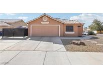 Charming single-story home with low-maintenance desert landscaping and two car garage in a quiet neighborhood at 7621 Gosport Ave, Las Vegas, NV 89131