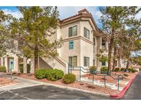 Inviting condo exterior with well-maintained landscaping and visible unit numbers at 2109 Echo Bay St # 104, Las Vegas, NV 89128