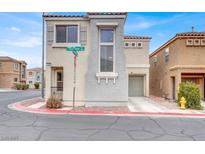 Charming two-story home with a stucco exterior and an attached garage in a residential neighborhood at 5246 Aurora Beam Ave, Las Vegas, NV 89122