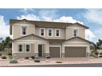 Two-story home with a two-car garage, neutral paint, stone accents, and a well-maintained desert landscape at 1175 Viento View Ave, Henderson, NV 89012