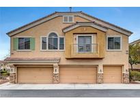 Charming home featuring a three-car garage and neutral stucco exterior with lovely architectural details at 1552 Wild Willey Way, Henderson, NV 89002