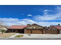 Charming single-story home featuring a well-maintained front yard and an attached two-car garage at 3407 Bristlecone St, Las Vegas, NV 89146