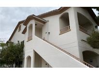 A view of the apartment complex showing the multiple levels and staircase at 5650 E Sahara Ave # 2041, Las Vegas, NV 89142