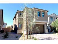 Charming two-story home with neutral paint, landscaped yard, and attached two-car garage at 6507 Dove Point Pl, Las Vegas, NV 89130