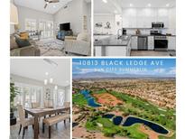 Open-concept living space boasting vaulted ceilings and lots of natural light at 10813 Black Ledge Ave, Las Vegas, NV 89134