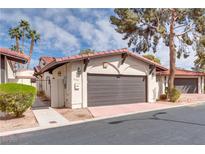 Charming single story home featuring a large two-car garage and well-kept landscaping at 2532 Whippoorwill Ln, Las Vegas, NV 89121