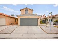 Charming home featuring a two-car garage and low-maintenance landscaping at 2793 Sandyfalls Way, Las Vegas, NV 89142