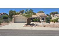 Charming single-story home featuring desert landscaping and a spacious two-car garage at 3117 Brightridge Dr, Las Vegas, NV 89134