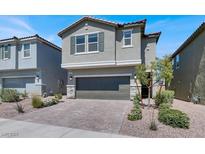 Charming two-story home showcasing a neutral color scheme, two-car garage, and a well-maintained landscaped yard at 4588 Swimming Minnow Ave, Las Vegas, NV 89141