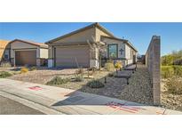 Charming single-story home featuring a two-car garage, desert landscaping, and a walkway to a private entry at 9698 Pacific Pine St, Las Vegas, NV 89143